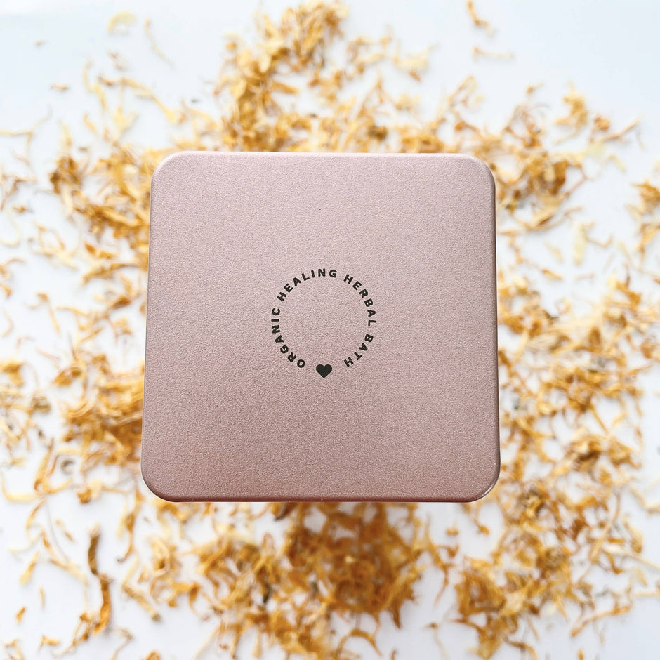 Organic Herbal Sitz Bath box by Mother Mother on white background with dried herbs