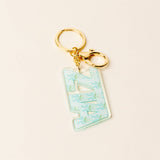 Sorority letter acrylic keychain with floral pattern and gold-tone hardware
