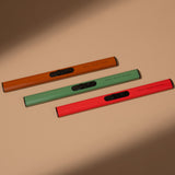 Sweet Water Decor rechargeable electric lighters in orange, green, and red colors displayed on neutral background