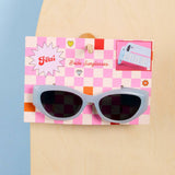 White bride sunglasses on pink checkered background with 'Bride Sunglasses' text and bridal graphics