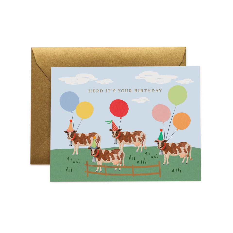 Herd It's Your Birthday greeting card with cows, balloons, and gold envelope