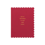 Red scalloped-edge Christmas card with gold foil text reading 'merry christmas to you and yours'