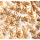 Close-up of toasted meringue swirls