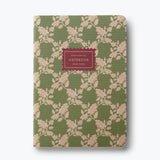 Rifle Paper Co. green floral notebook with ruled pages and burgundy label on white background