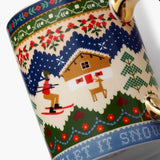 Rifle Paper Co. Ski Chalet porcelain mug with winter holiday design and gold handles