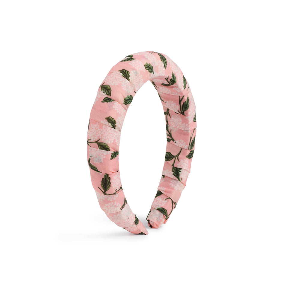 Floral patterned headband on a white background