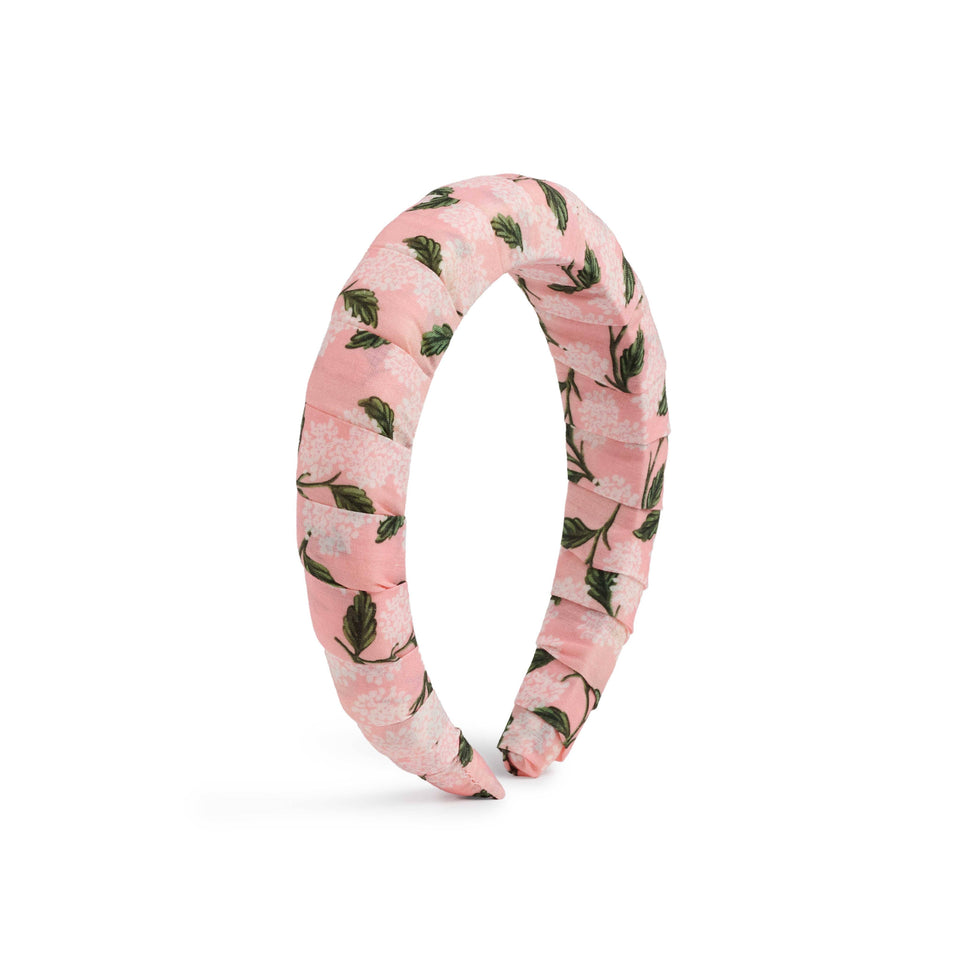 Floral patterned headband on a white background