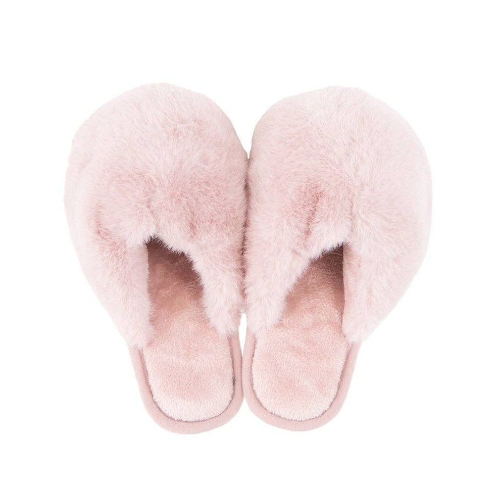 Light pink faux fur women's jumbo slippers viewed from above on white background