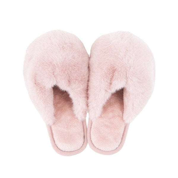 Light pink faux fur women's jumbo slippers viewed from above on white background