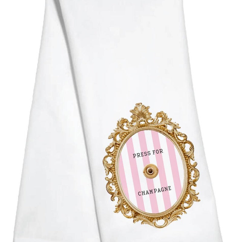 White kitchen towel with gold ornate frame and pink striped champagne design