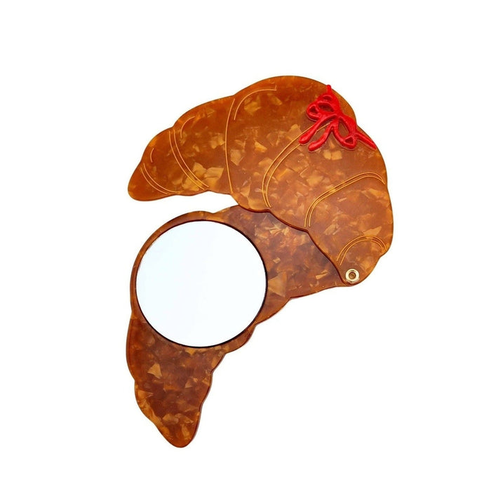 Solar Eclipse hand-painted bow croissant compact mirror with rose gold finish and red bow detail