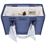 Blue Case-Mate tote organizer with white interior compartments holding phone, sunglasses, and accessories