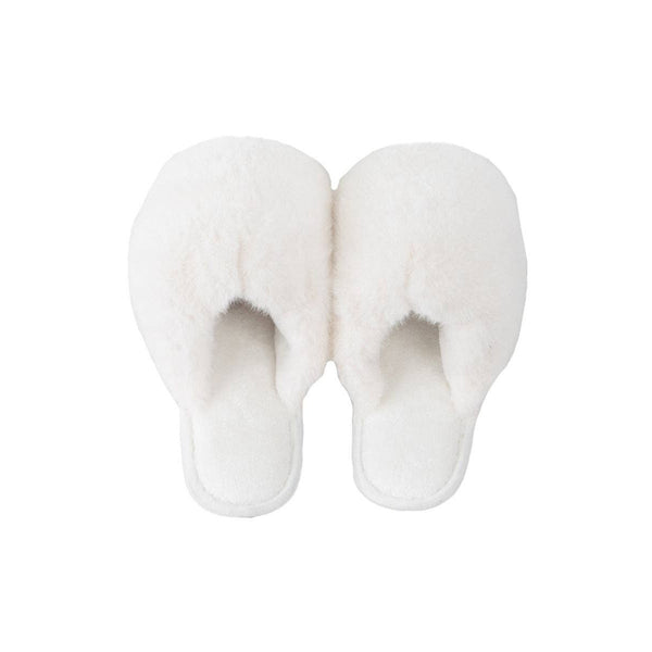 White faux fur jumbo slippers with plush padding and open toe design, overhead view