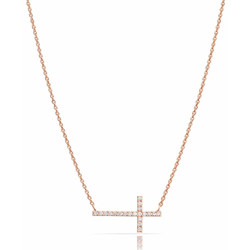 Rose gold minimalist CZ cross pendant necklace on delicate chain against white background
