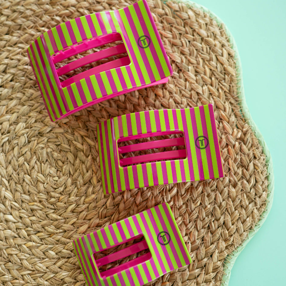 TELETIES Summer Crush Large Flat Rectangle Hair Clips in neon pink and lime green striped pattern displayed on woven texture