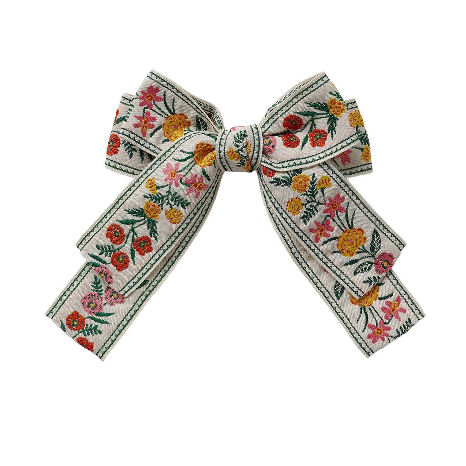 Rifle Paper Co. Garden Study Jacquard Ribbon Bow Clip with colorful floral embroidered pattern on cream background