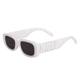 White Wifey sunglasses with dark lenses and embossed temple detail on neutral background
