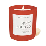 Sweet Water Decor Happy Holidays soy candle in red vessel with fresh cut trees, orange and cloves scent