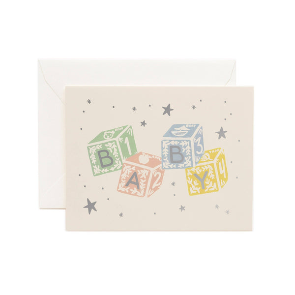 Classic Baby Blocks Card by Rifle Paper Co. featuring colorful alphabet blocks with stars on cream background