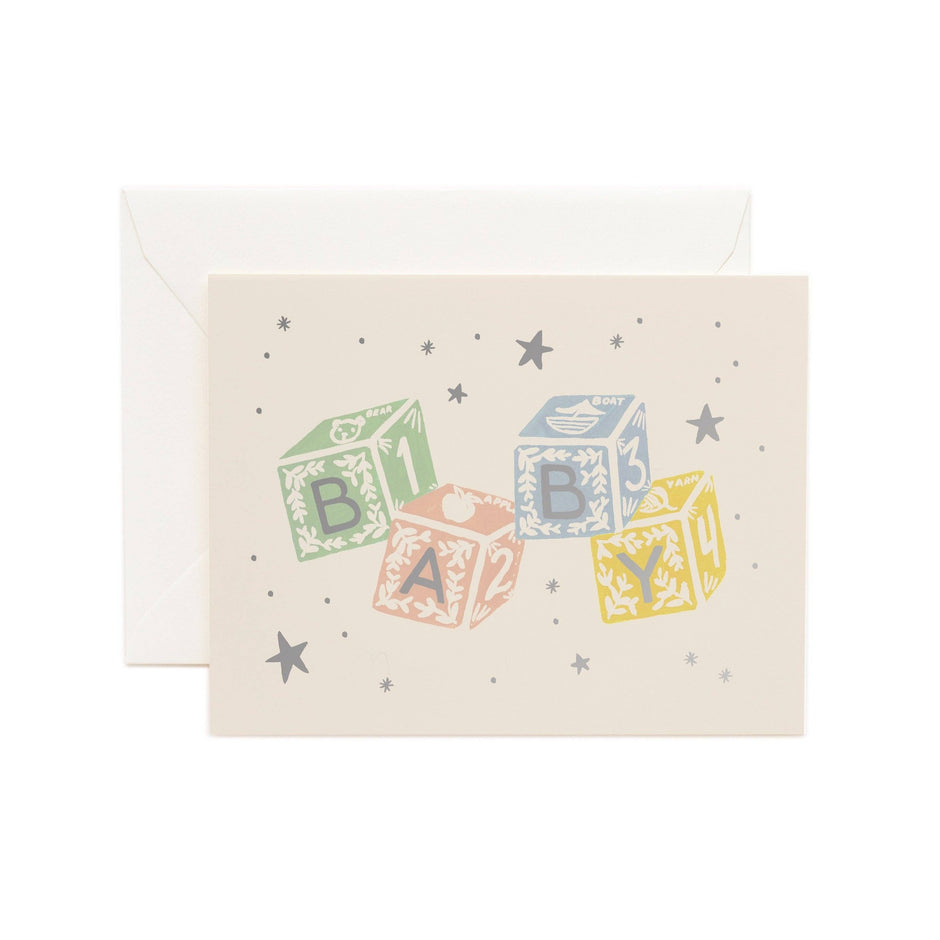 Classic Baby Blocks Card by Rifle Paper Co. featuring colorful alphabet blocks with stars on cream background