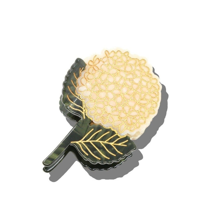 Solar Eclipse hand-painted hydrangea claw hair clip with gold and black design