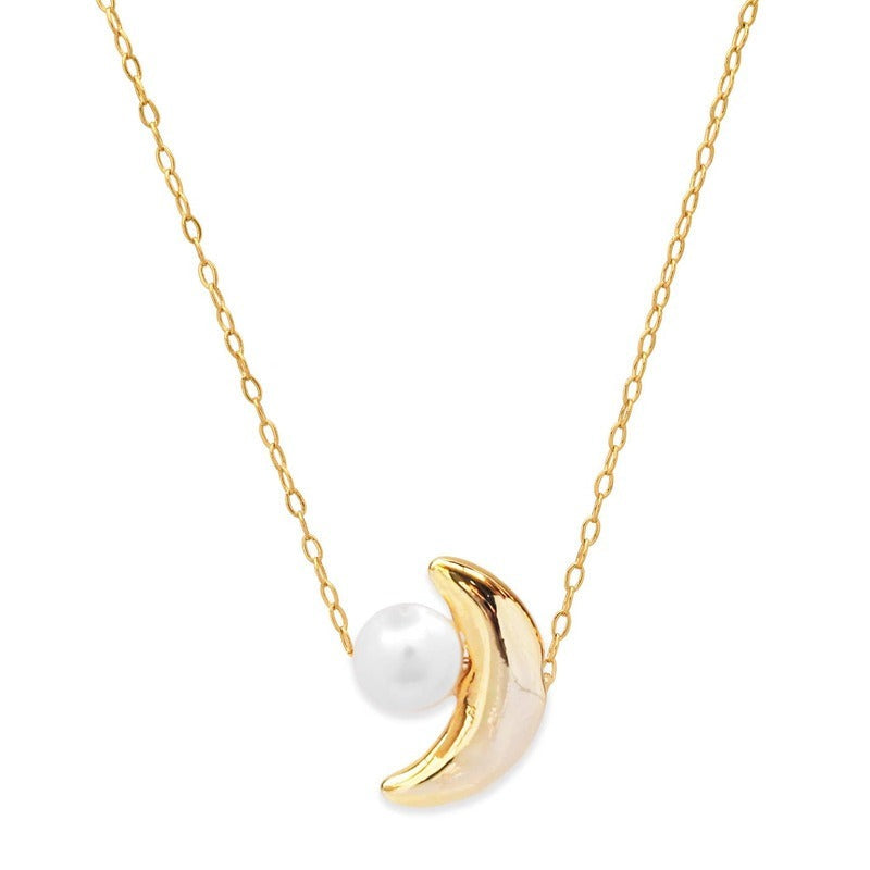 Gold moon pendant necklace with white pearl on delicate chain