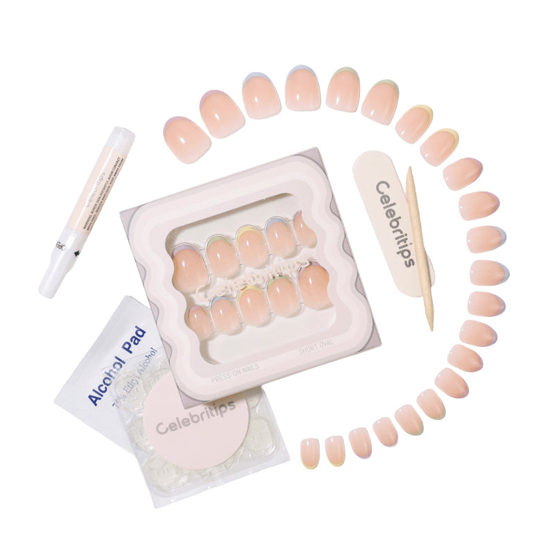 Nail art kit with false nails, alcohol pad, and tool on a white background