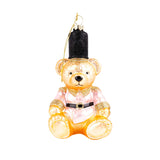Gold and pink glittery teddy bear glass ornament with black top hat and gold string