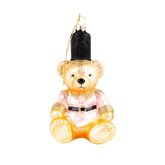 Gold and pink glittery teddy bear glass ornament with black top hat and gold string