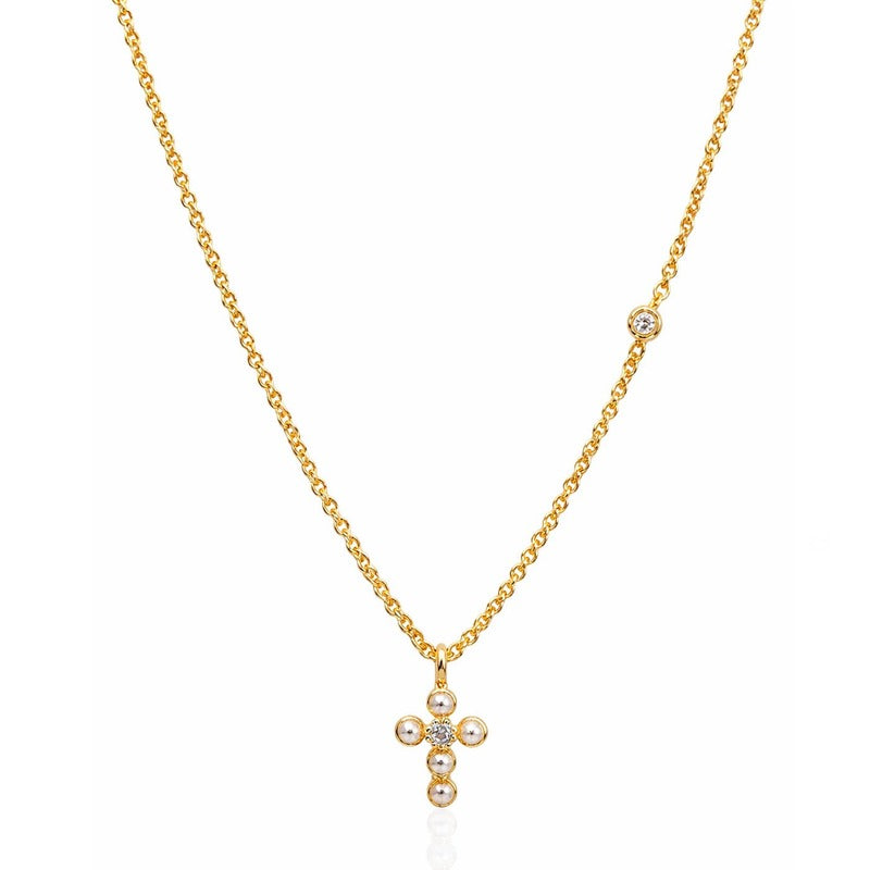 Gold mini pearl and CZ cross necklace with delicate chain on white background