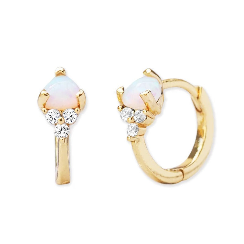 Gold opal hoop earrings with cubic zirconia accents on white background