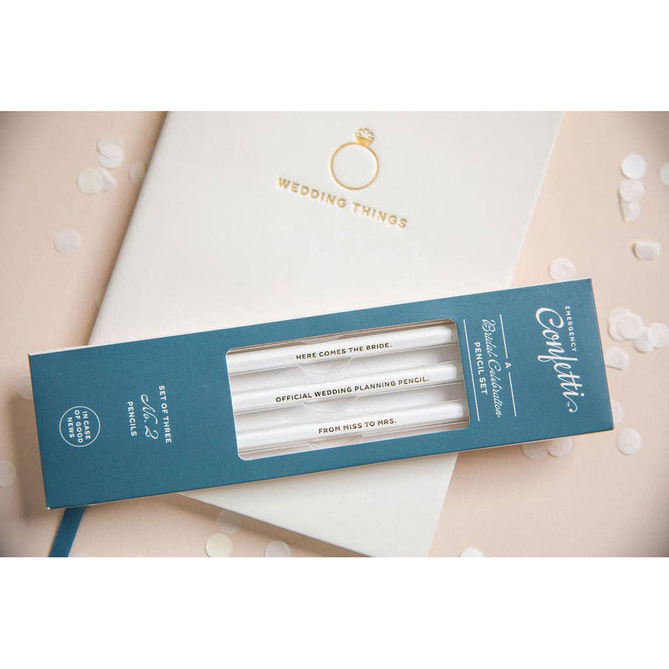 Bridal celebration pencils set with wedding-themed designs displayed in elegant blue packaging