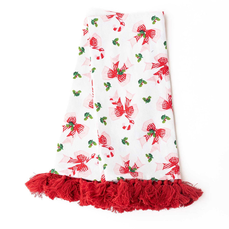 Holly Jolly Bows Tassel Kitchen Towel Set with red bows, holly leaves, and red fringe trim