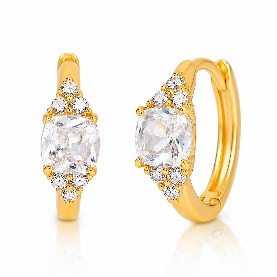 Gold marquise CZ huggie earrings with cushion-cut cubic zirconia stones and crystal accents
