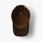 Brown corduroy baseball cap shown from inside top view on neutral background