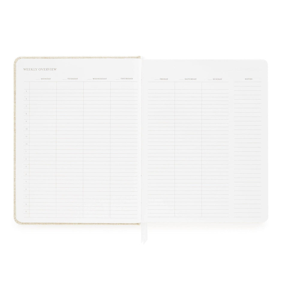 Undated daily planner with weekly overview layout showing Monday through Sunday columns and notes section