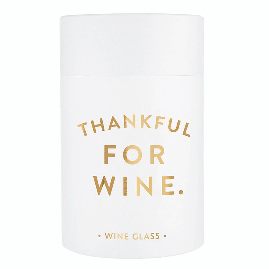 White stemless wine glass with gold 'Thankful For Wine' text design by Santa Barbara Design Studio