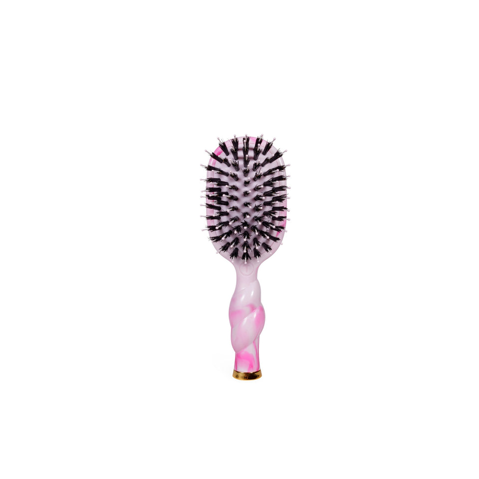 TELETIES Mini Boar Brush in Pinch Me pink with gold ferrule on black background