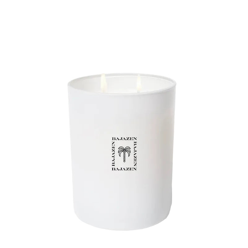 White candle with a brand logo on a white background