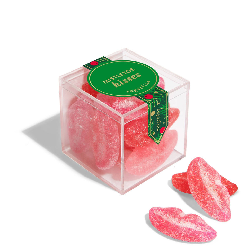 Sugarfina Mistletoe Kisses sugar-coated gummy candies in clear cube box with green label