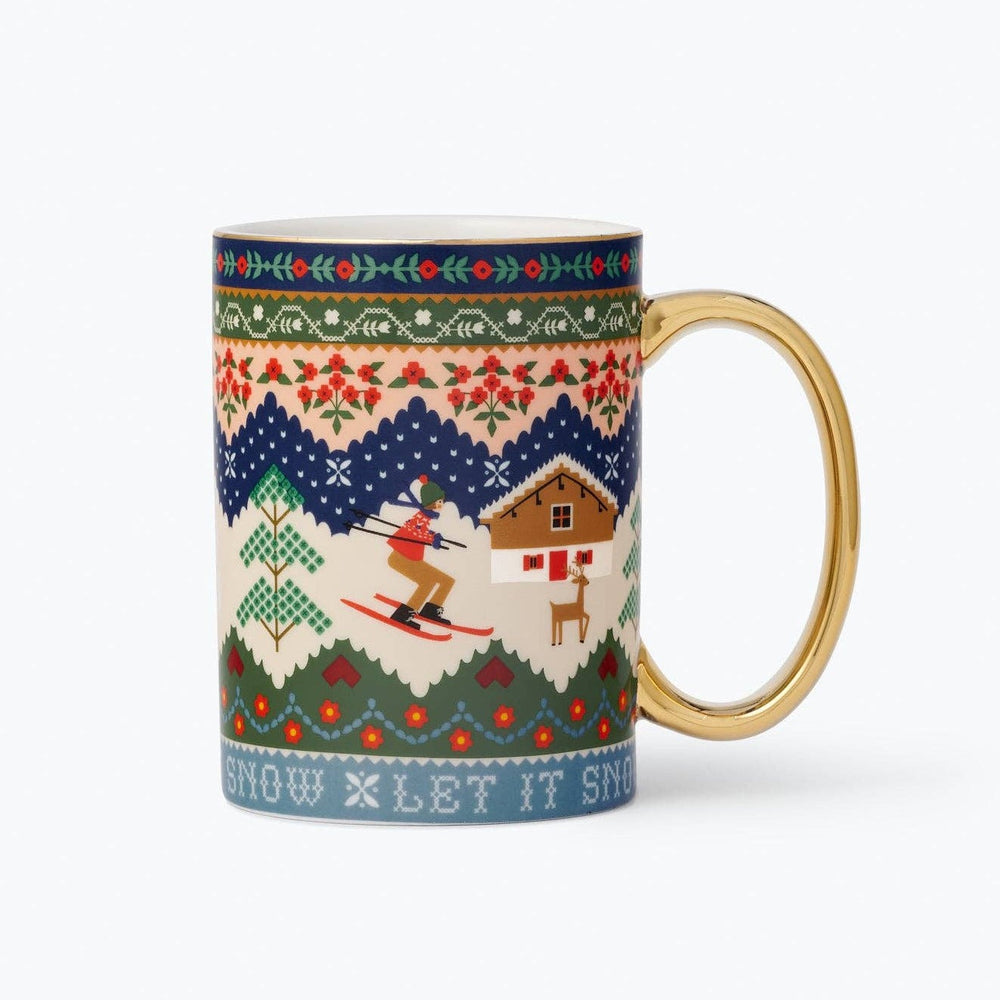 Rifle Paper Co. Ski Chalet porcelain mug with gold handle featuring winter holiday knit pattern design