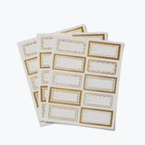 Gold floral sticker and label sheets with decorative borders on white background