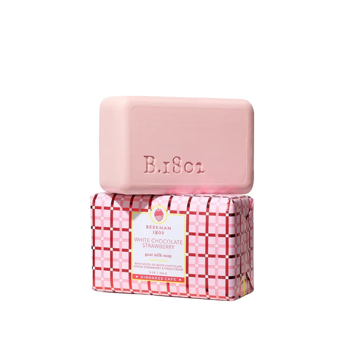 Pink White Chocolate Strawberry goat milk soap bar stacked on its pink plaid gift-wrapped box on a white background