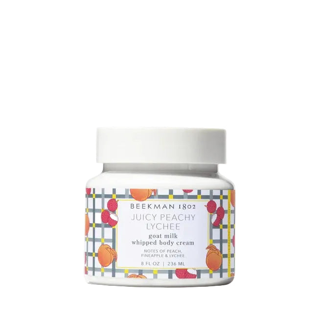 Jar of Beekman 1802 Juicy Peachy Lychee whipped body cream on a white background
