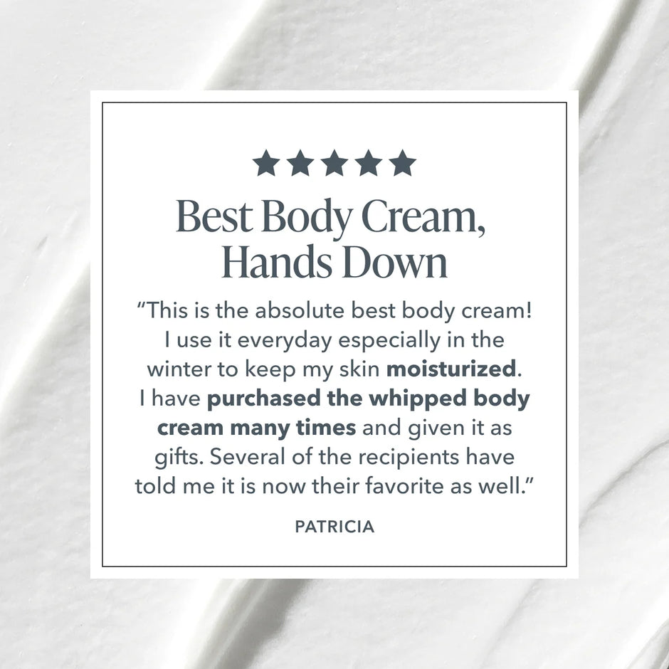 Five-star customer review reading Best Body Cream, Hands Down over a swatch of whipped body cream