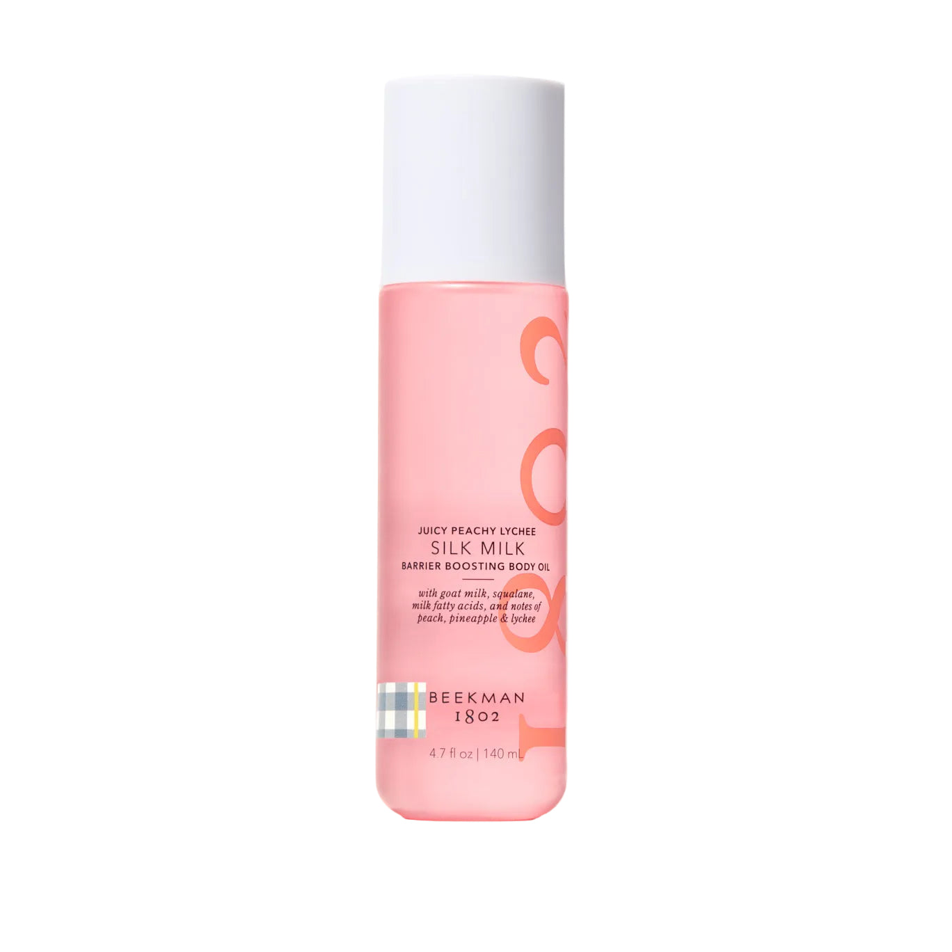 Pink bottle of Silk Milk body oil with a white cap on a white background