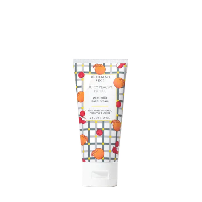 Beekman 1802 hand cream tube with colorful packaging on a white background