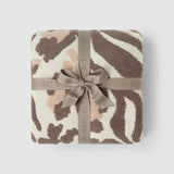 CozyChic Marbella Leopard Throw in Sandstone Multi, folded and tied with a ribbon bow