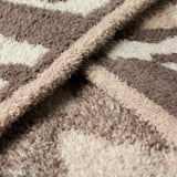 Close-up of the CozyChic Marbella Leopard Throw fabric in Sandstone Multi