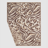 Second flat view of the CozyChic Marbella Leopard Throw in Sandstone Multi with one corner folded back